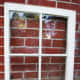 Start with an old window. Clean and prep it so that you can paint the frame.