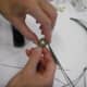 Coil the first group of pine needles into a circle, and wrap it with thread to start the pine needle basket.