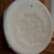 Embossed ornament with no color added.