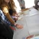 Making kids hand-prints with salt clay dough.