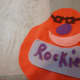 Pieces sewn onto front of body.
