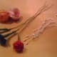 Wired flowers or leftover favor materials can also be used to decorate Barbie hats