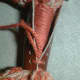 Your first stitch should have both ends (1 long and 1 short) inside the leather, so that you can tie a knot to secure them.