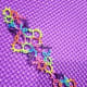 A lovely multicolored sample of tatting.
