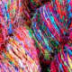Silk sari yarn is brilliantly coloured, thin and very flexible. This is the preferred yarn for knitting and crochet projects.