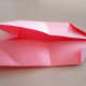 Close the top flap. You will see the corner is now on the inside.