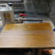 Applying teak oil to the tabletop