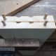 Dowel glued into the ends of the shelves.