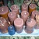 Candles made using a variety of containers as moulds.