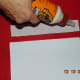 Step #5 Put a strip of glue down the cloth.