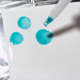 Dropping ink onto a ceramic tile