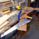 I shortened the two ends of the middle shelf, to account for the dado joint in the two end supports.