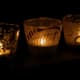 Small lit candles add a soft illumination.
