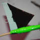 Continue wrapping the pieces around the center of the flower