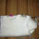 Photo 1: Pin and sew the side seam using back stitch.