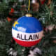 My Allain family ornament is an orb styled after the Acadian flag.