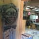 Entering Andrew's downstairs workshop: carvings, power tools, storage areas