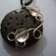 Lava stone with silver wire wrap and pink crystals