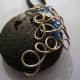 Lava stone with silver wrap and blue crystals
