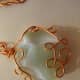 Jade with copper wrap