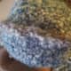 Crocheted part directly on to cap.  Made tail at the start and finish long enough to blend in with other strands of hair.