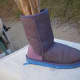 Step 4: Dye the boots. Put the newspaper or brown paper into your boots to keep them from flopping over while you work.