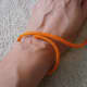 Wrap the paracord around the wrist snuggly