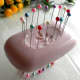 Pins on top and bottom of soap