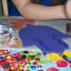 Start with paint and let it dry before adding more decoration.