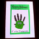 Apply green and black paint to your kid's hand to make a spooky frankenstein.