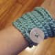 Crochet bracelet with button.