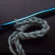 Single stitch around the loop.