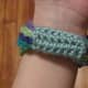 Chain stitch bangle with crocheted band.
