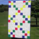 Turn your nine-patch blocks into a simplified Irish chain quilt. Just alternate nine-patch blocks with solid setting blocks cut to the same size.