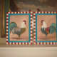 Pair of rooster paintings