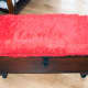 Foam covered with red faux fur