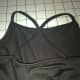 Cross the straps, then sew them back on.