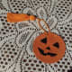 Yarn glued to front of the bookmark holding the tassel in place.