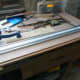 Routing the recessed lip for fitting the glass to the door