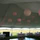 This frame tent is lined tent with pink ball lights.