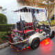 This cart is liberally draped with strings of lights and has the underbody cart lights too.