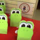 Watch a video showing how to make these Yoshi Loot Bags at the source link.