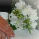 White lily, Carnations, and Ornithogalum (Star of Bethlehem) bring variation of a pure white theme.