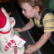 Helping to decorate the house, this little guy found a particularly intriguing decoration...
