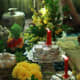 Silver and gold trays are traditional along with fresh fruit, flowers, and candles.
