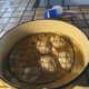 The eggs will float if you don't hold them down. I used a wire cooling rack.