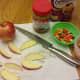 Cut apples into slices.