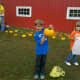 Picking out his pumpkin during our pumpkin patch visit.