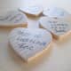 This is a sweet and inexpensive option to take any kind of wooden shapes, let guests write a little message and their name. Keep them in a glass container or other keepsake box.