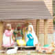 Purchased plastic set with homemade manger from logs and corrugated roofing